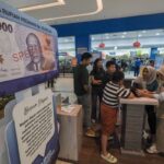 Rupiah Tertekan, Tembus Rp16.455 per Dolar AS Hari Ini